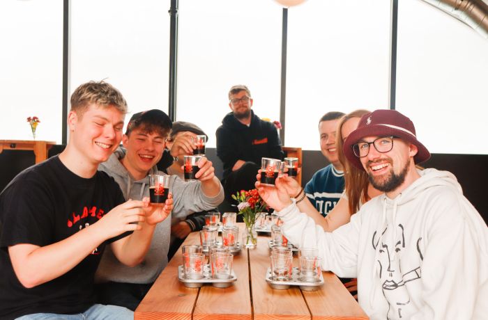 Group tasting beer on 3 locks brewery tour in camden