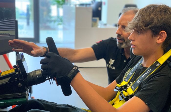 A boy and instructor driver training