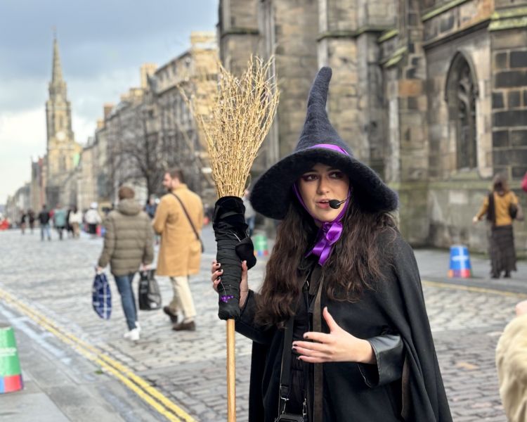 guide on street talking on a witches walking tour in edinburgh