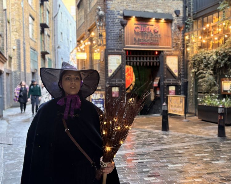 guide on london street on a witches walking tour in london
