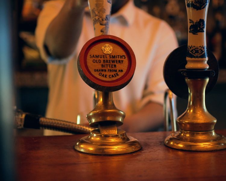Close up shot of a tap handle at london pub
