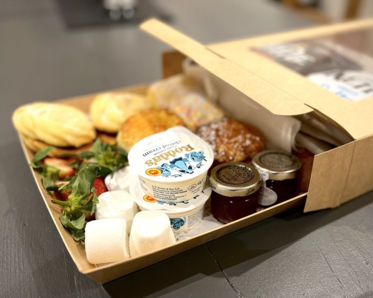 afternoon tea unboxing on a meet the alpacas experience in shropshire