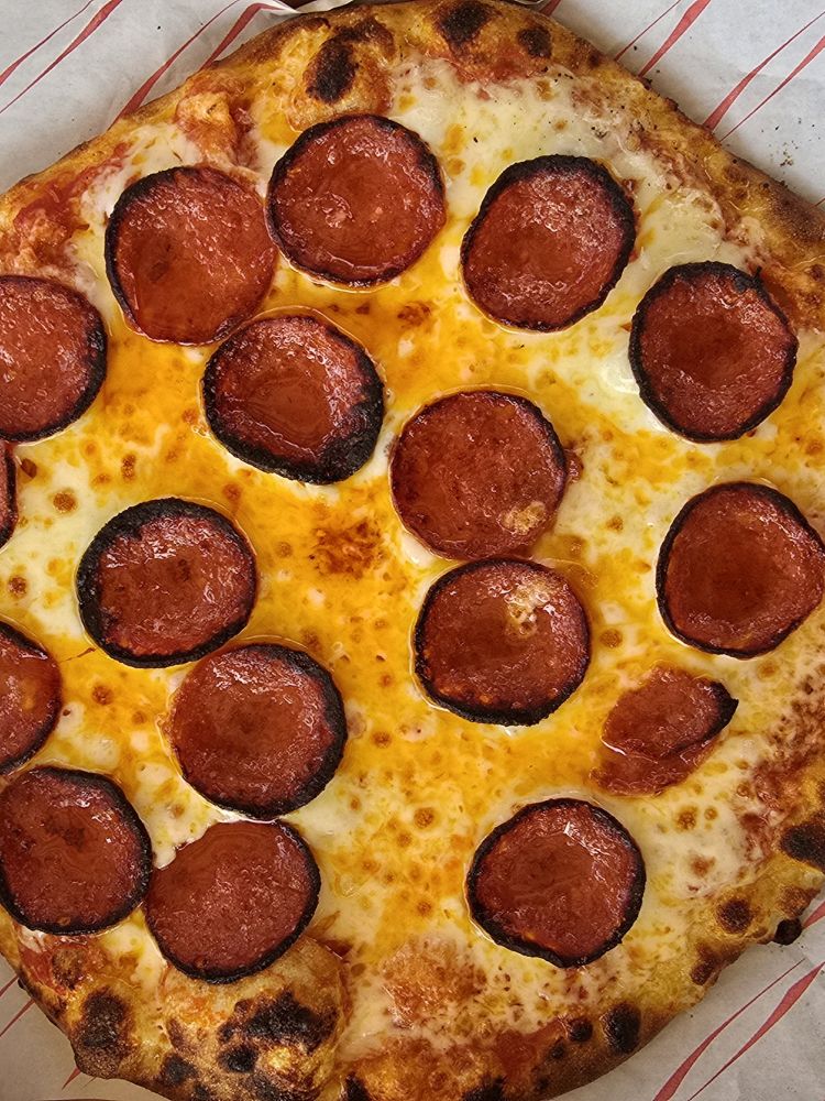 Pepperoni pizza made in pizza making class