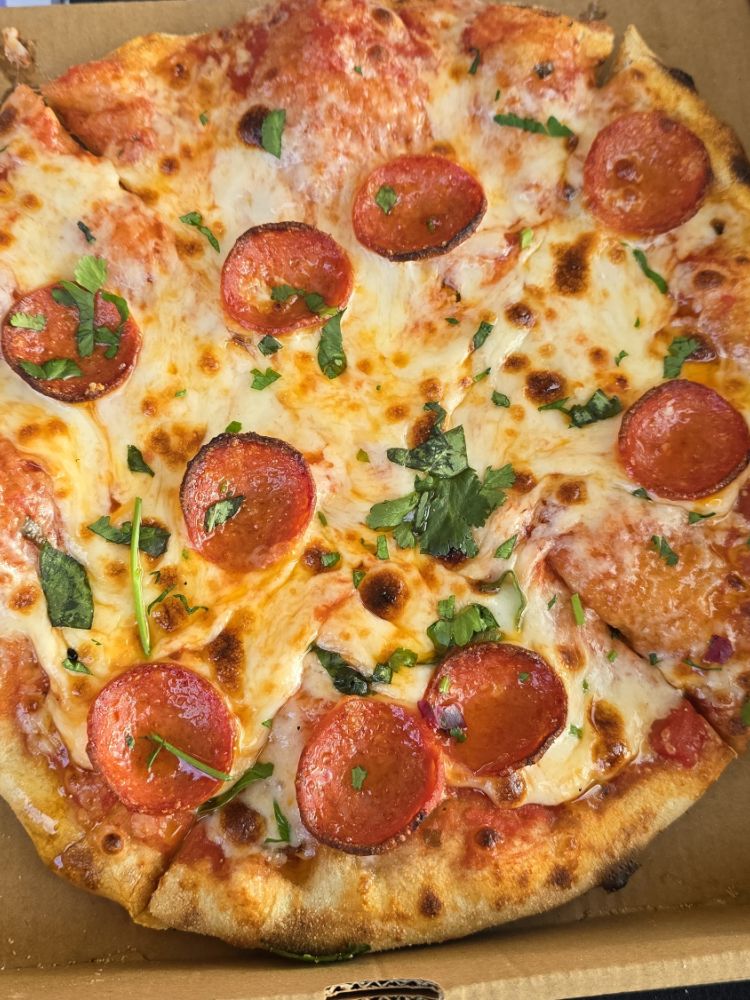 Pizza in box made at pizza making class