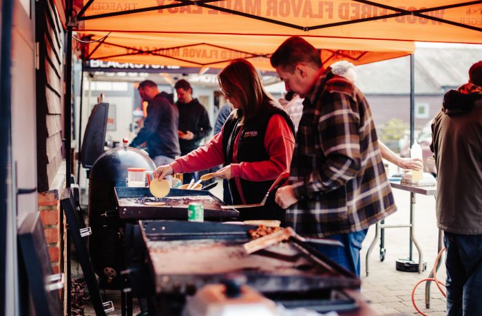 people cooking on blackstone griddle bbq on a cooking experience on how to use these bbq's