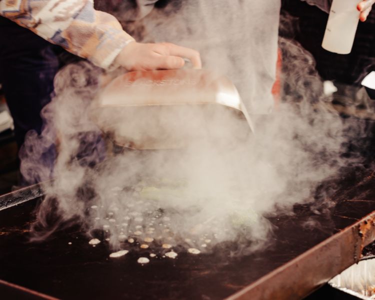cooking and steaming on a blackstone griddle bbq on a class learning how to use them