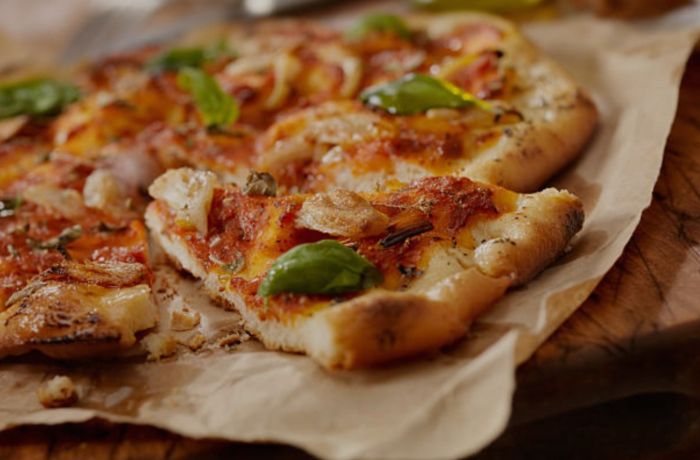 Margarita pizza on brown paper