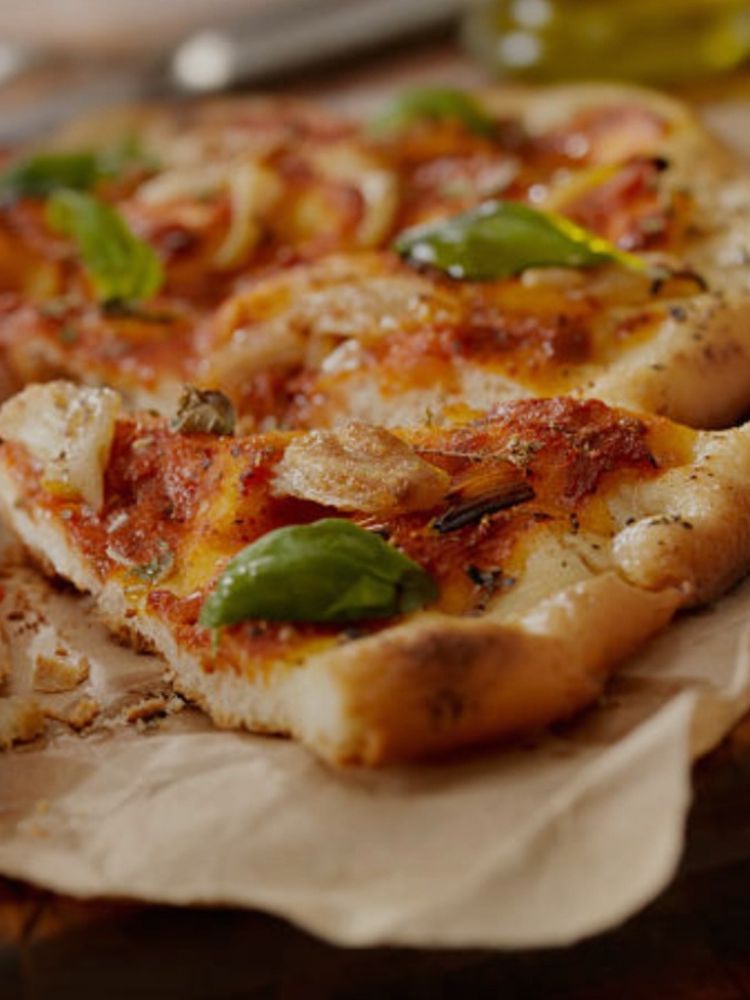 Margarita pizza on brown paper