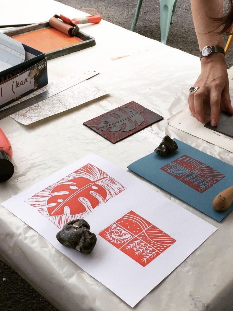 printed designs made on a lino printing workshop