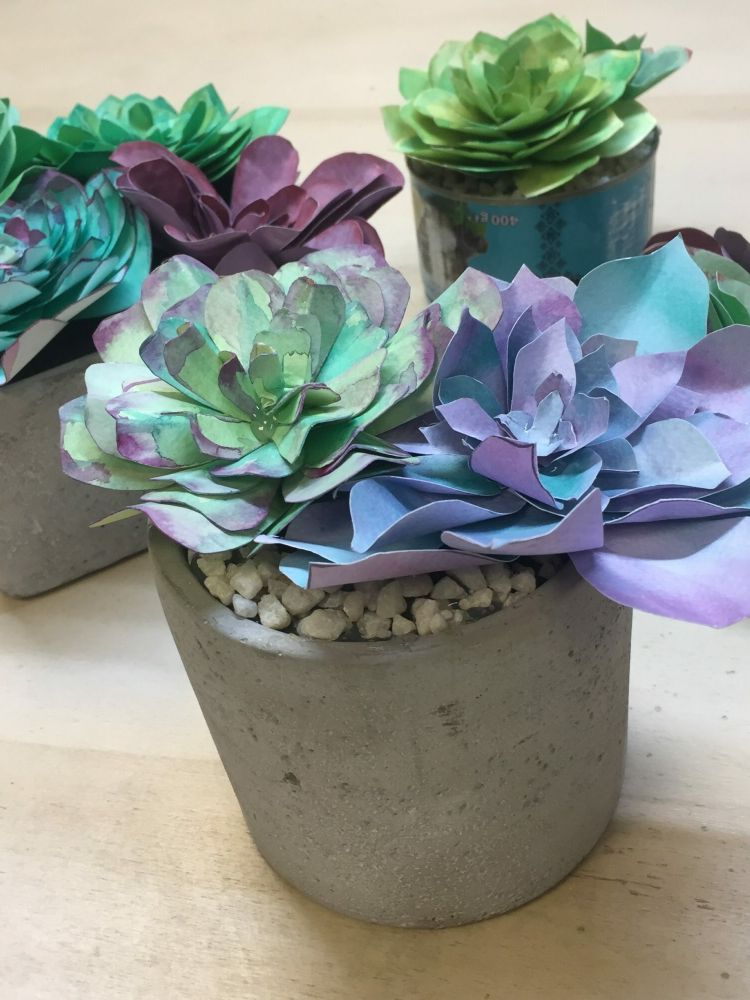 flowers made out of coloured paper on a craft workshop