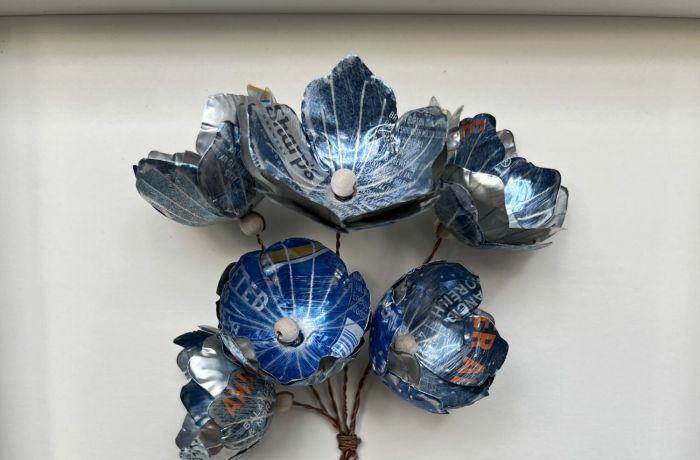 flowers made from cut up metal drinks cans