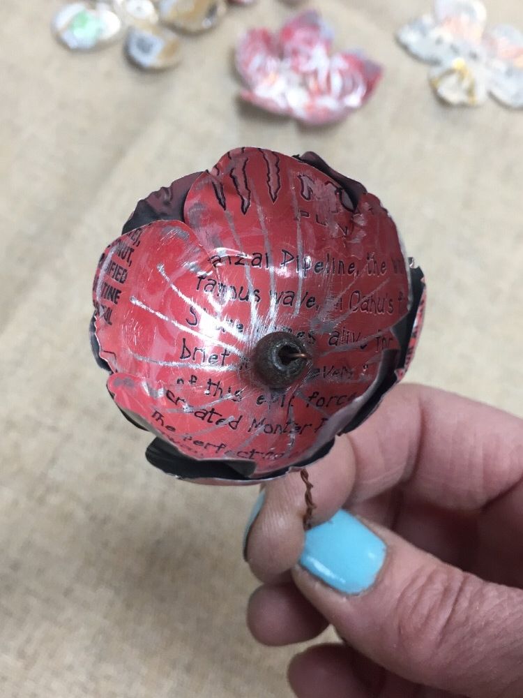 flower made from cut up recycled metal drinks cans