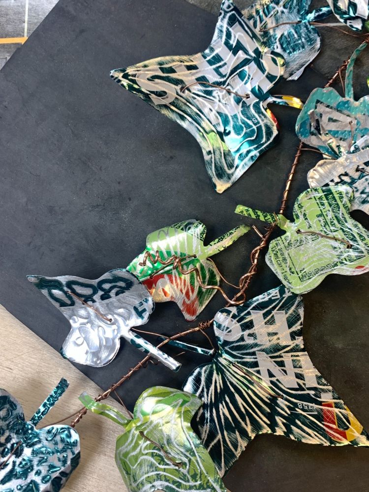 an ivy garland made from recycled metal drinks cans
