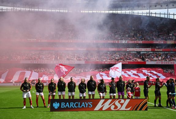 arsenal womens team lined up on pitch before match