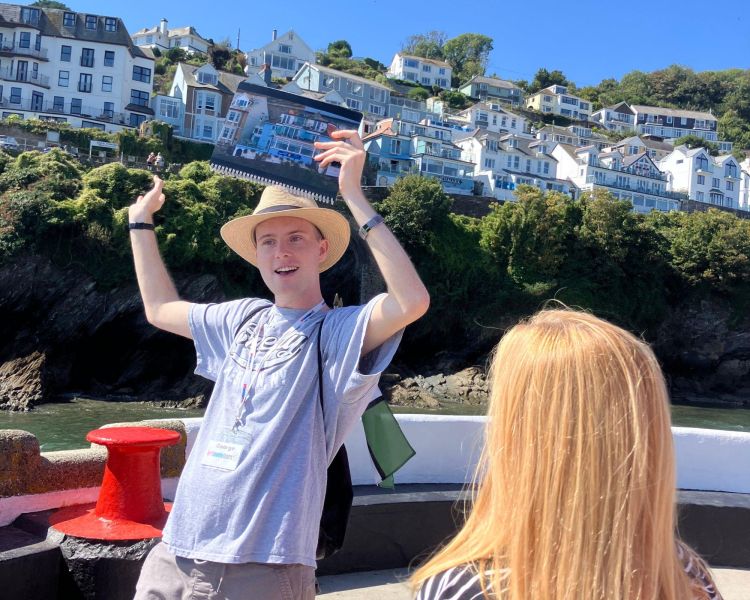 beyond paradise tour guide showing locations to group