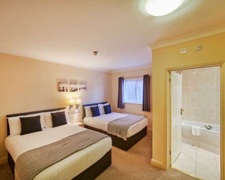 Twin bedroom at the barn hotel