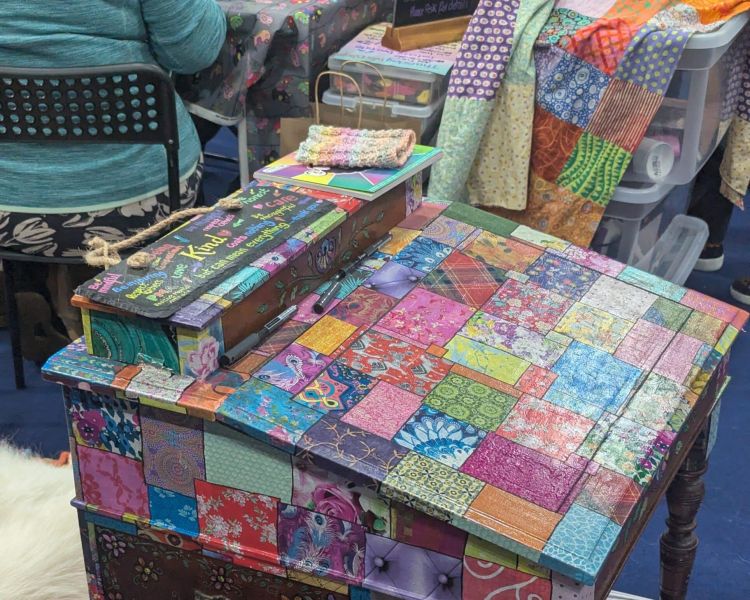 Cabinet covered in decoupage papers