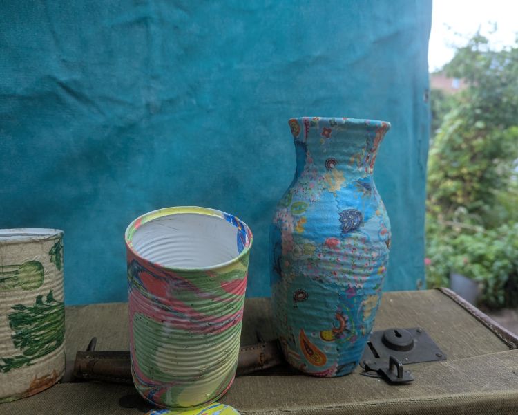 items covered in decoupage and water marbling patterns