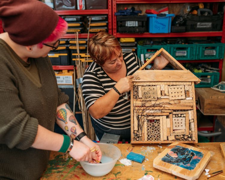 ladies making a bug house on one day course in somerset