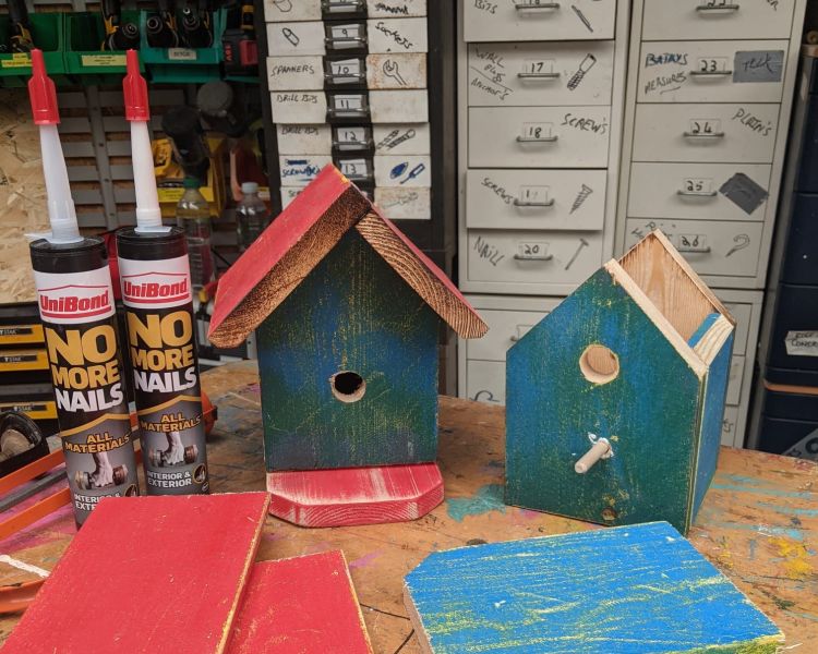 painted bird boxes made from wood offcuts on one day course in somerset