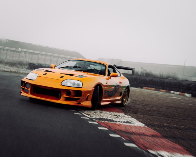 Fast and furious orange toyota supra on track