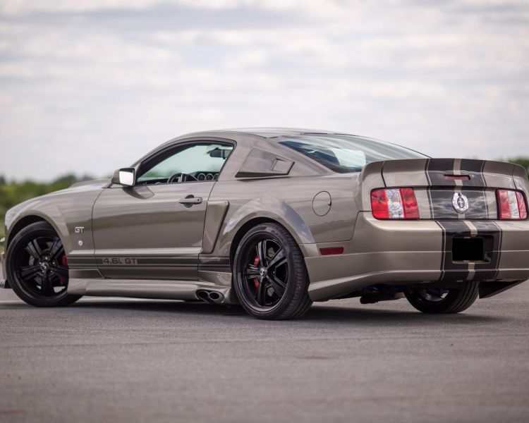 Rear view of grey ford eleanor mustang on track