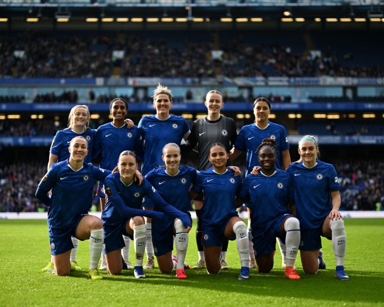 Chelsea women team photo on pitch at stamford bridge