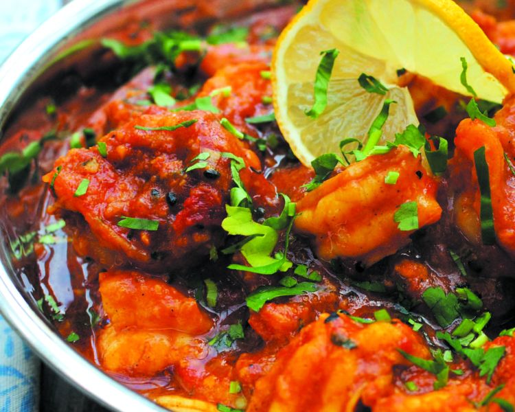 prawn masala in a dish cooked on a half day indian cookery course experience day