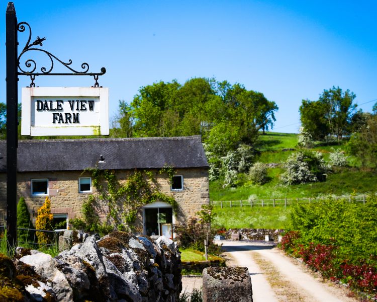 the peak blacksmith building down a country lane