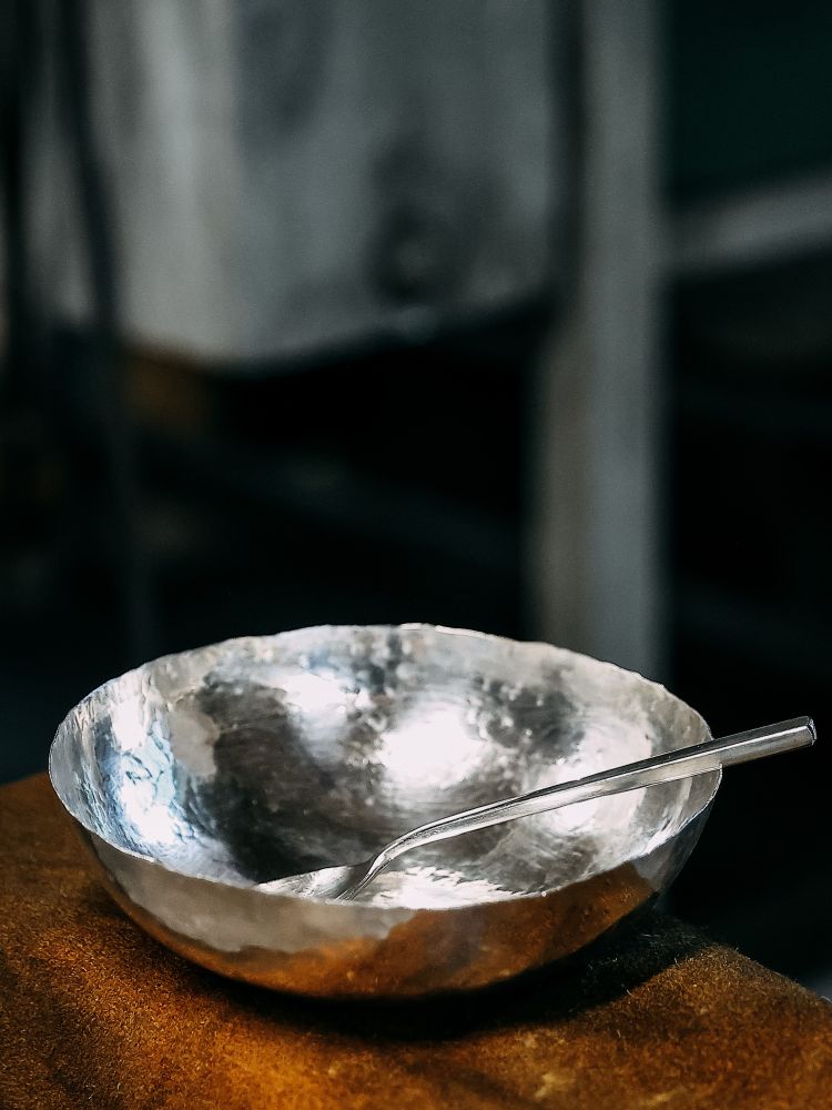 a copper bowl and spoon plated in silver made on a silversmith day course