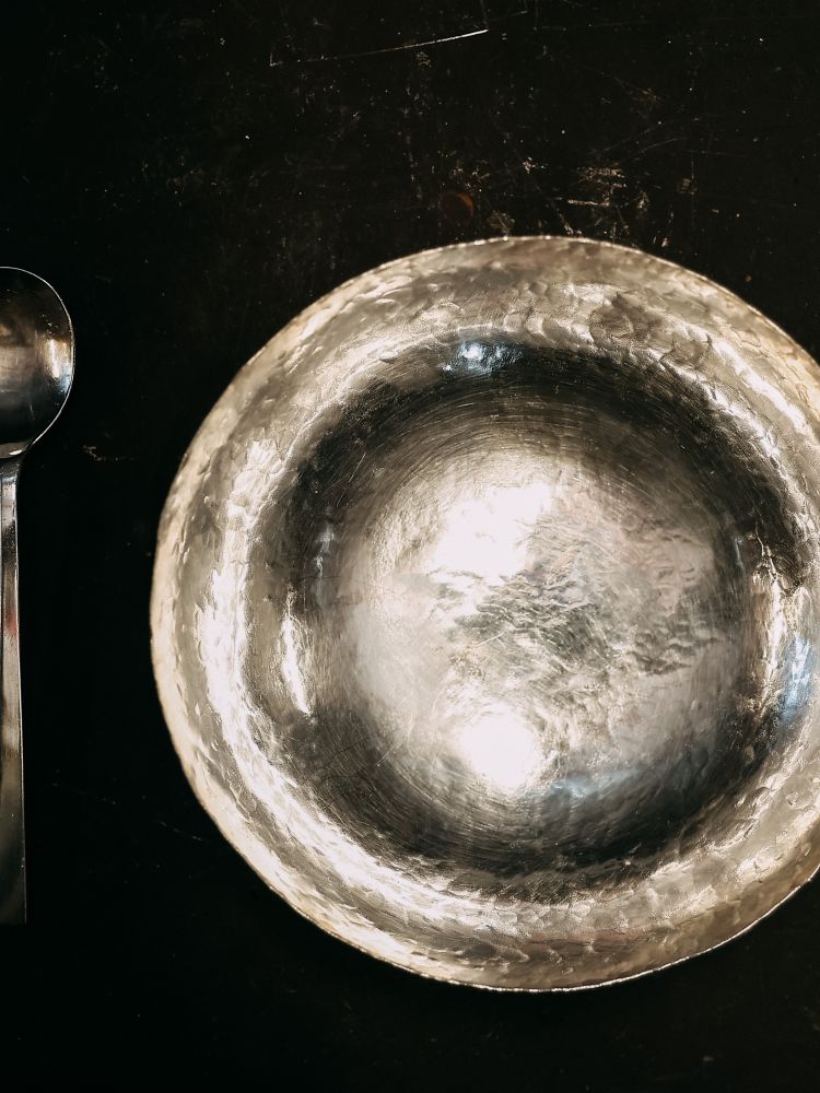 a bowl and spoon plated in silver made on a silversmithing day course