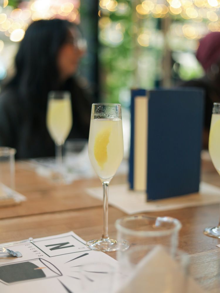 Glass of prosecco on table