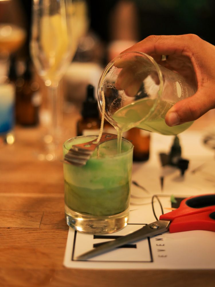 Pouring wax into candle jar