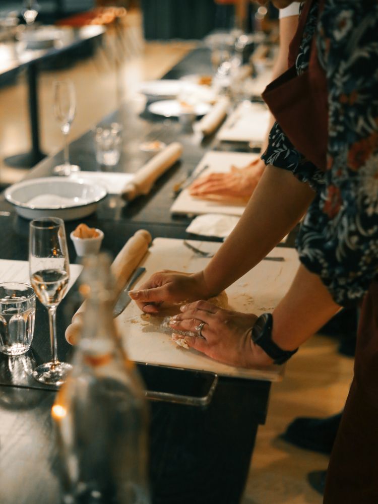 Kneading pasta dough at pasta making class