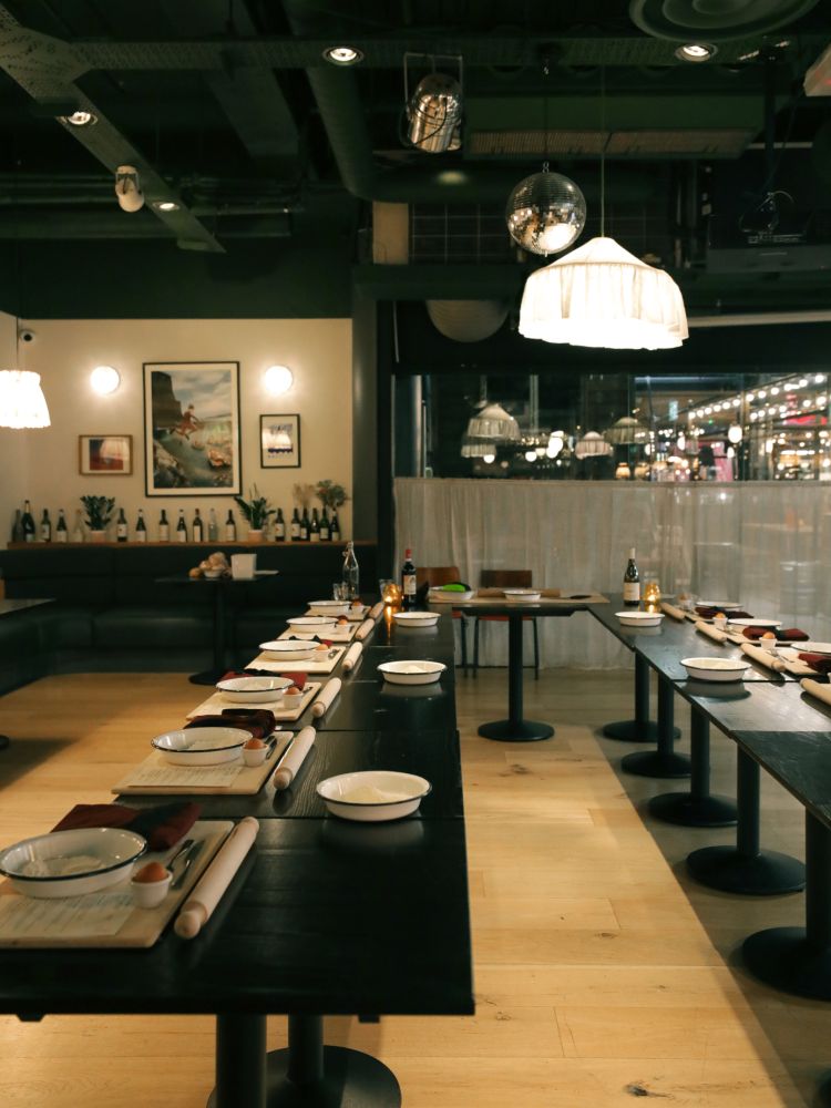 Tables set up ready for pasta making class
