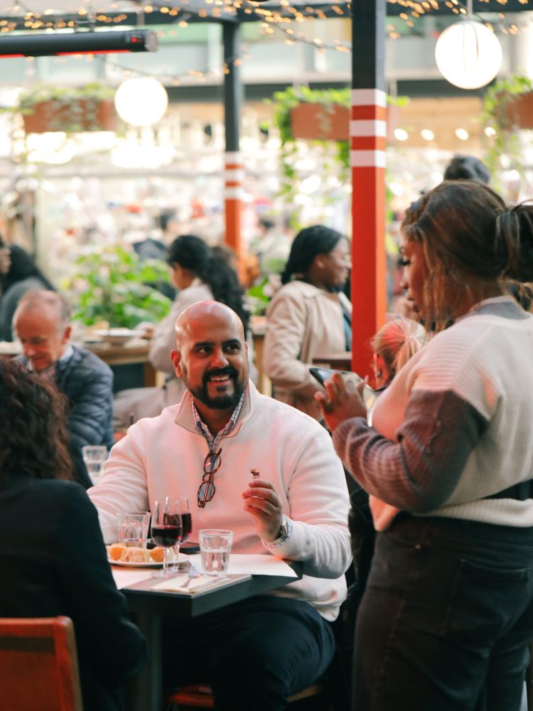 People at table for italian supper club