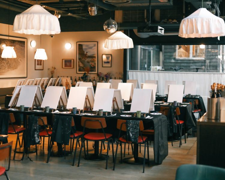 Paint and prosecco evening set up in restaurant