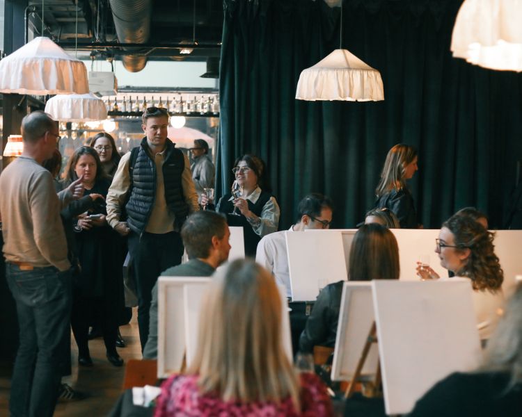 People arriving to a paint and prosecco evening