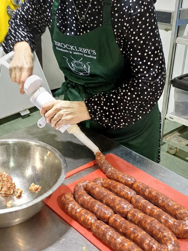 chorizo stuffing on a continental sausage making workshop