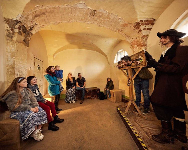 Families enjoy a guided tour at oxford castle and prison