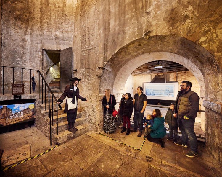 Guests at the start of their guided tour at oxford castle and prison