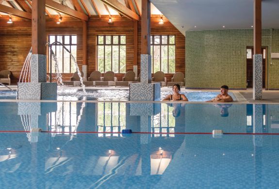 couple in swimming pool at bannatyne health club and spa