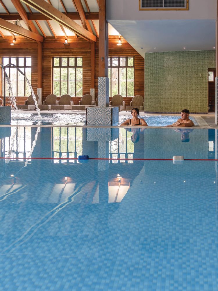 couple in swimming pool at bannatyne health club and spa