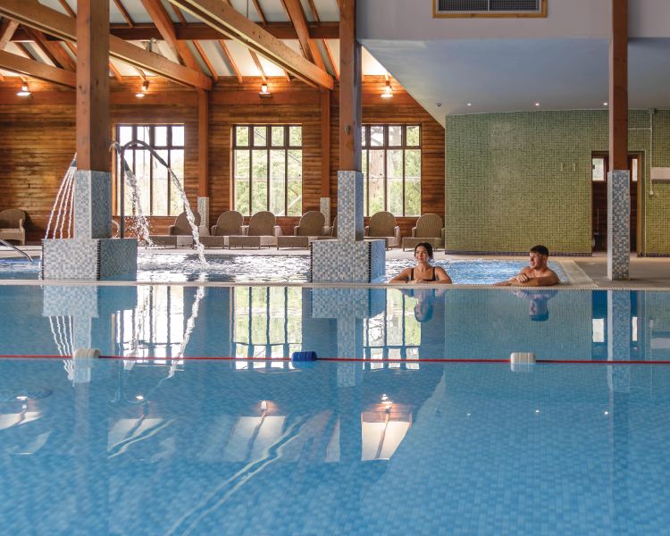 couple in swimming pool at bannatyne health club and spa