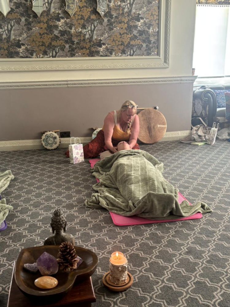 woman lying down having meditation on a wellness retreat day