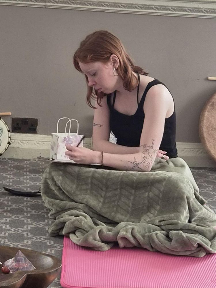 woman journaling on a wellness retreat day