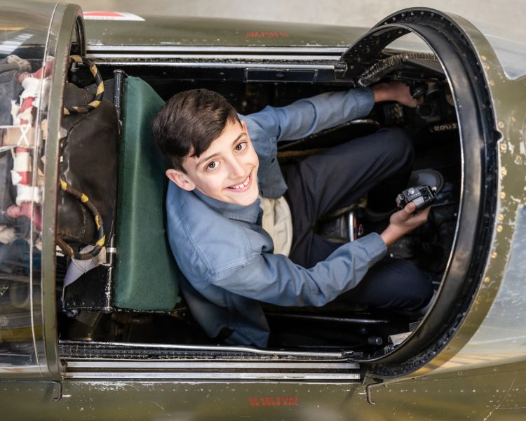 boy in vintage car at brooklands museum