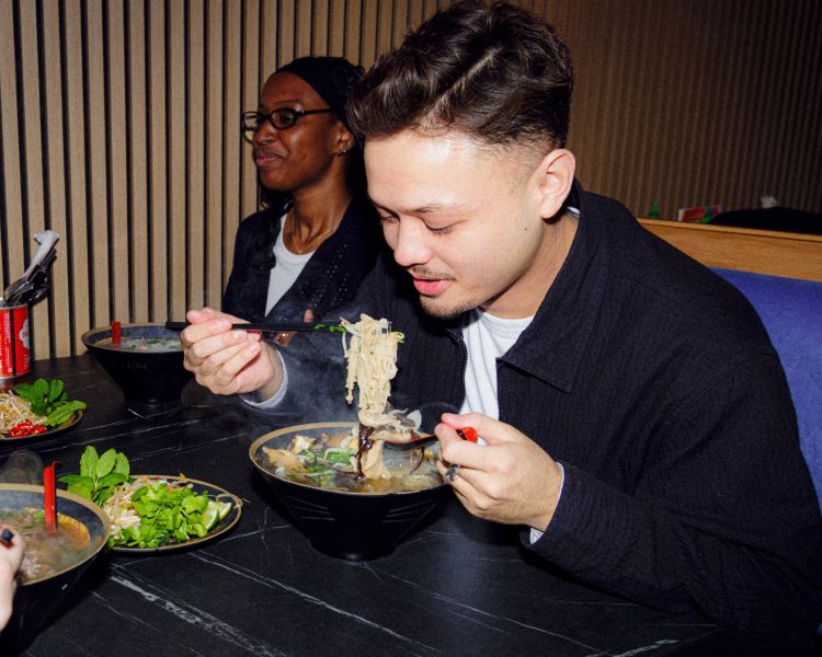 Friends eating ramen on a food treasure hunt in manchester