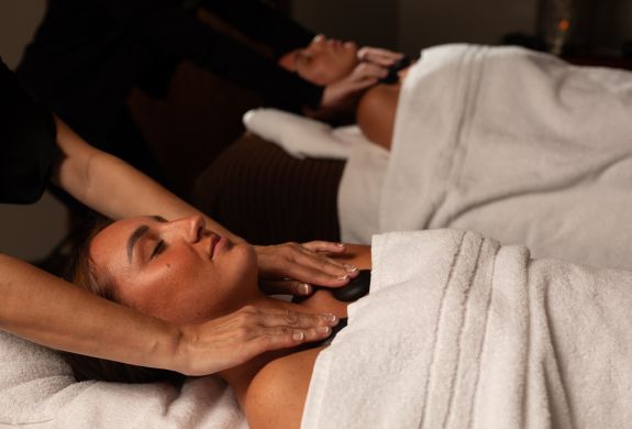 Close up of a woman hot stone massage