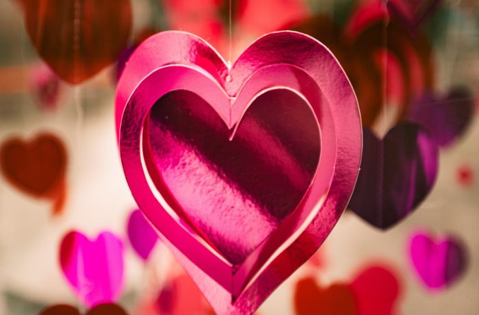hanging pink hearts made from shiny pink card